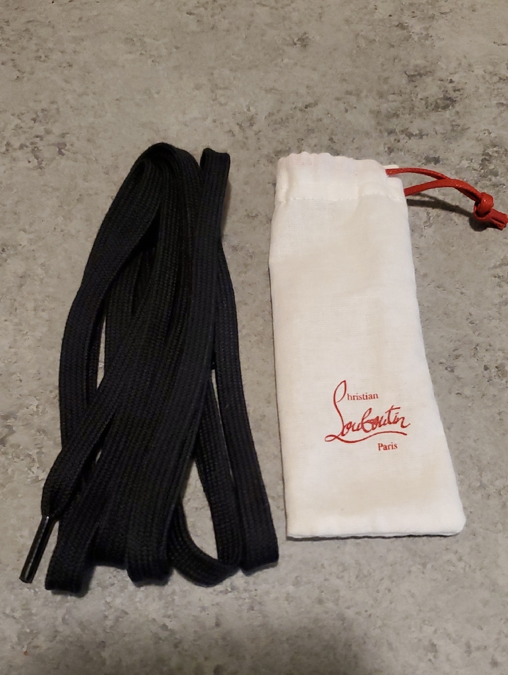 Christian Louboutin Black Flat Shoelaces with Branded Pouch
